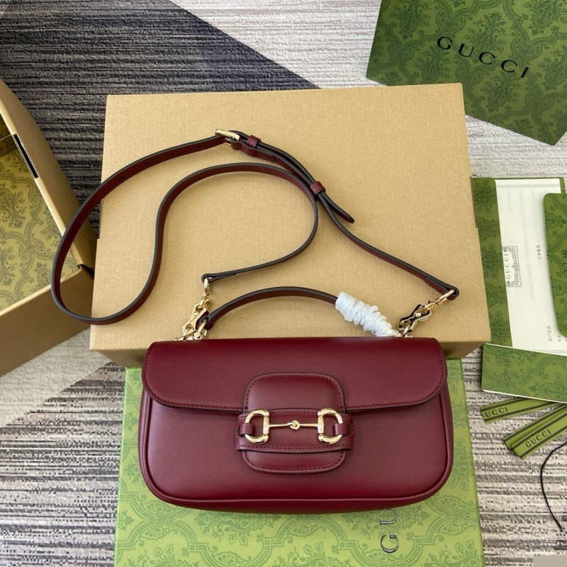G*u*i top handle bags
